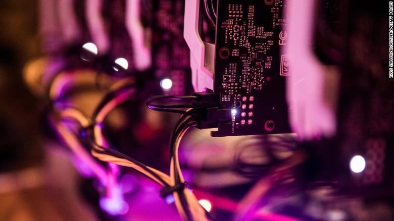 Graphic processing units (GPU) sit stacked inside a 'mining rig' computer, used to mine the Ethereum cryptocurrency, in Budapest, Hungary, on Wednesday, Jan. 31, 2018. 